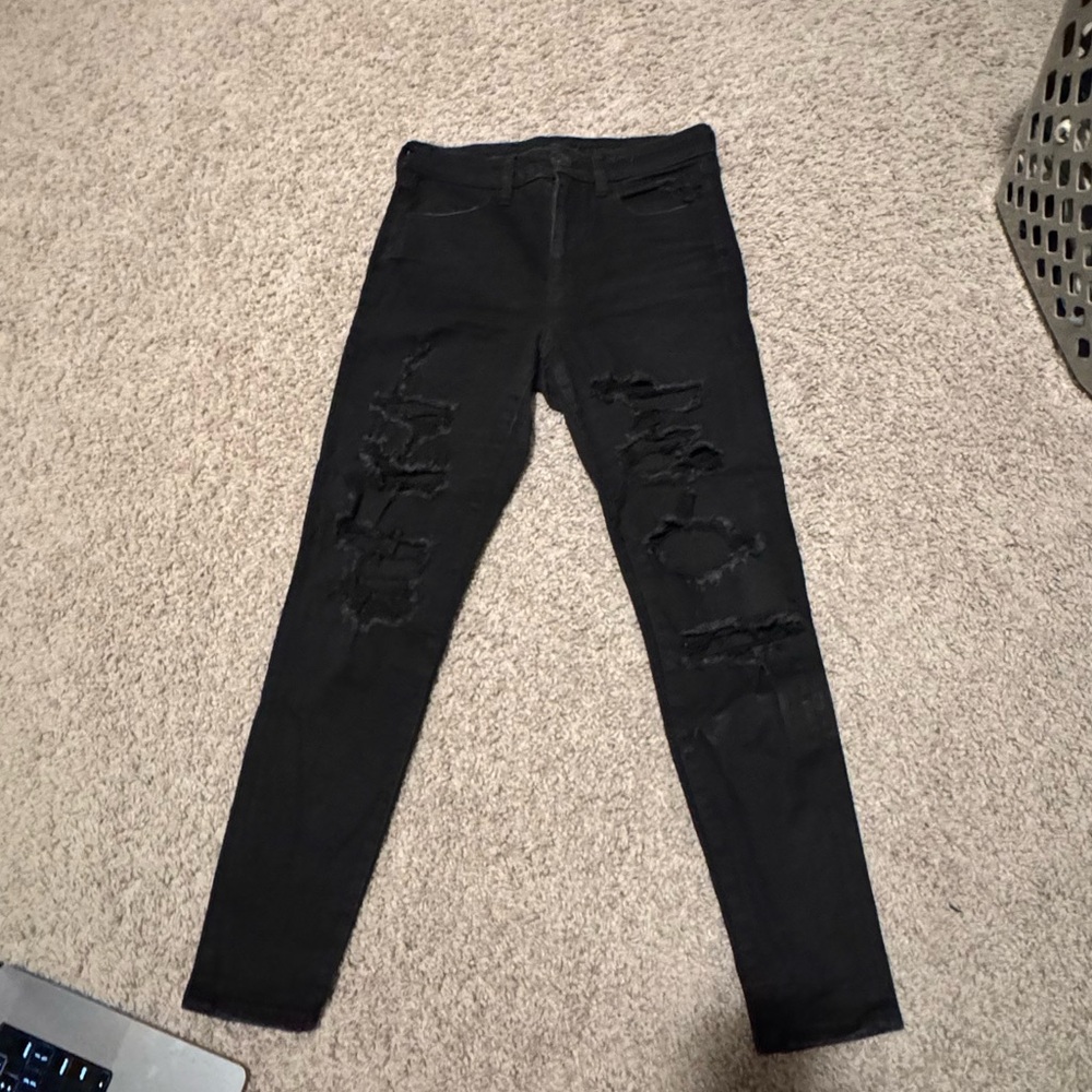 American Eagle Next Level Stretch Black Distressed skinny jeans